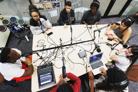 Overhead shot of teens during a podcast recording