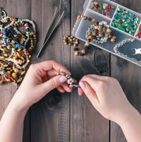 Hands Making Jewelry Craft